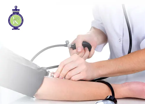 Healthcare professional measuring a patient's blood pressure using a sphygmomanometer, representing natural wellness approaches and essential oils for supporting healthy blood pressure management.